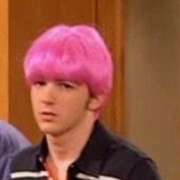 Drake wearing a pink wig