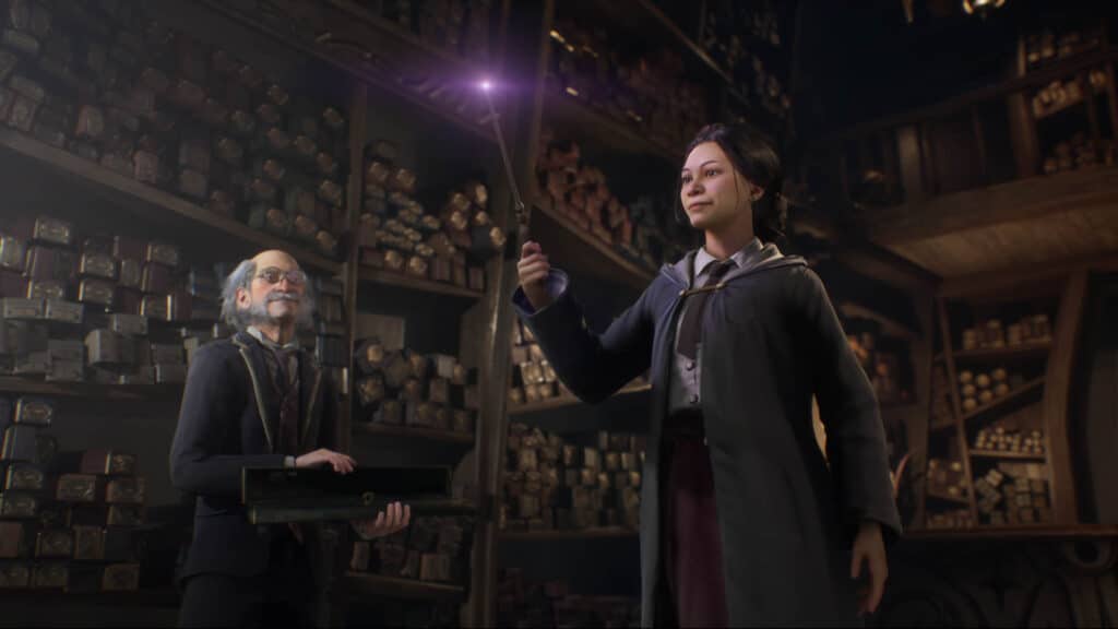 A student casts a spell while the teacher looks on