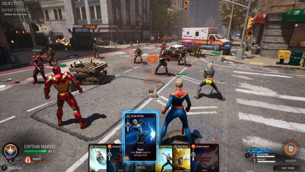 Captain Marvel, Iron Man, and Magik take on HYDRA enemies in the street.