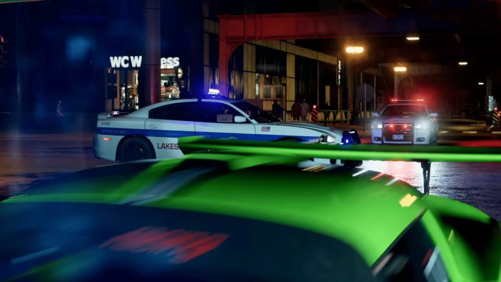 Two cop cars at an intersection about to crash into each other.