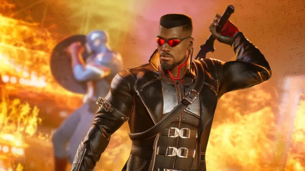 Blade standing in front of a blaze with Captain America in the background.