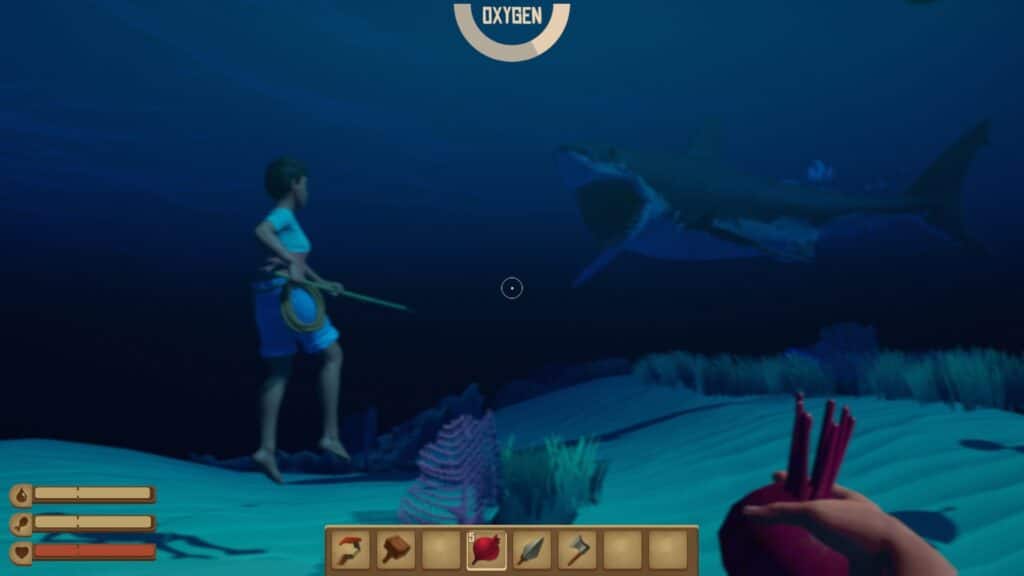 Two players underwater, one of them is actively fighting a shark, and the second is the player