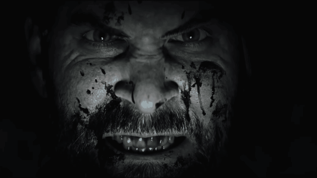 Image shows Alan Wake grimacing in Alan Wake 2 release date