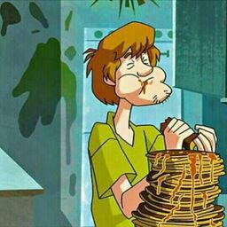 Shaggy eating pancakes with Scooby Doo