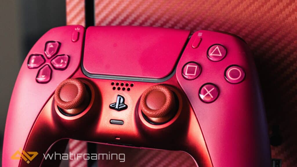 Image shows a custom PS5 controller in red placed against an Xbox Series X