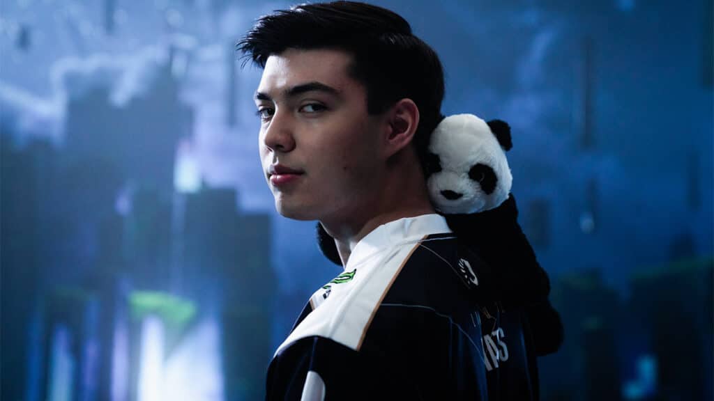 TL nAts posing with his stuffed panda.