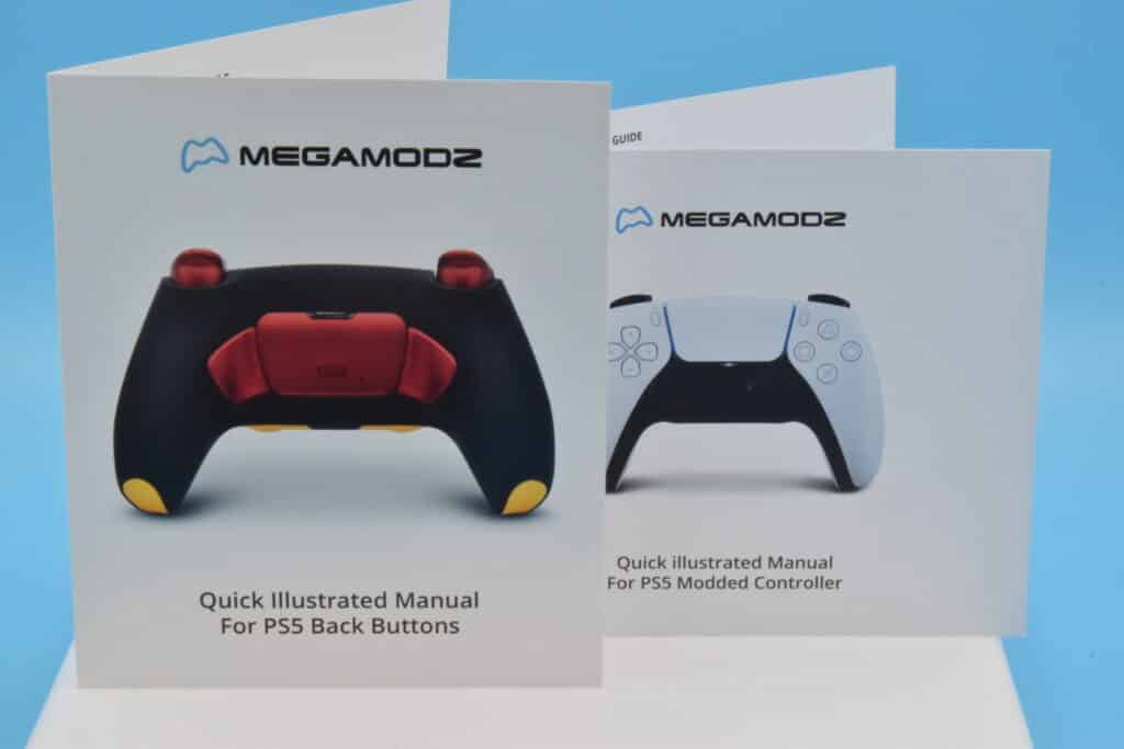 Image has two quick start booklets for MegaModz controllers