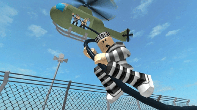 Image has a helicopter lifting a prisoner