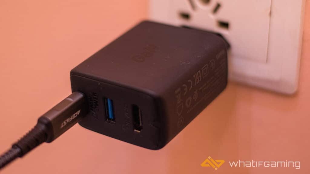 Image shows the Charger plugged in a power outlet Acefast GaN Charger Review