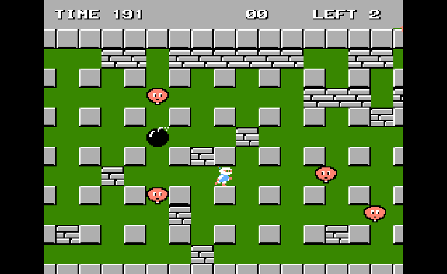 Bomberman navigating the maze in the first level.