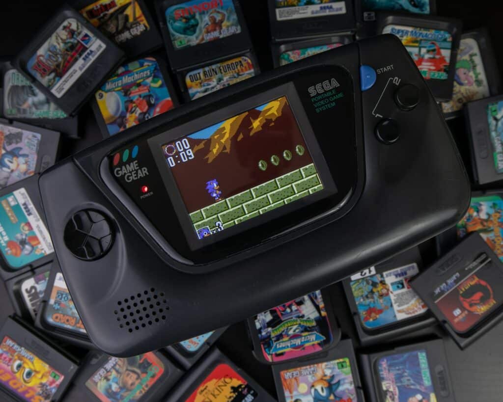 A Sega Game Gear with game cartridges.